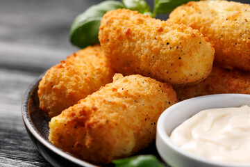 Homemade potato croquettes with mayonnaise. Traditional croquette.