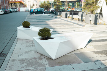 concrete white bench block and wave shape in the park .Curved edge to some outdoor seating with...