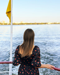 the girl looks at the water