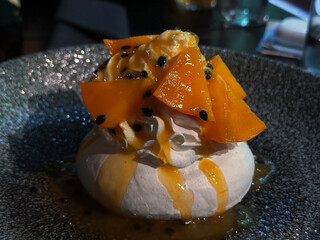 milk dessert with persimmon and syrup