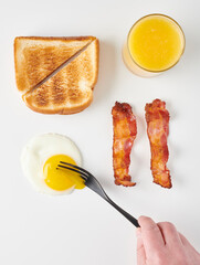 Breaking the Yolk: Bacon and Eggs