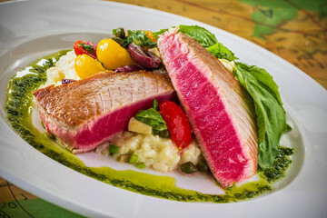 seared ahi tuna over a mixed green salad