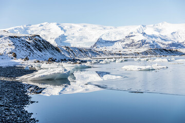 mountain reflection in Jökulsárlón, the glacier lagoon in Iceland