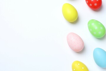 Happy Easter. Colorful eggs on white background, space for text or advertising