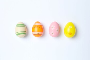Happy Easter. Colorful eggs on white background, space for text or advertising