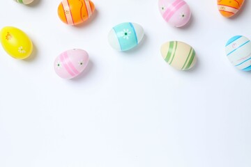 Happy Easter. Colorful eggs on white background, space for text or advertising