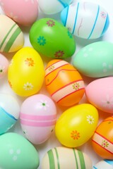 Happy Easter. Colorful eggs on white background, space for text or advertising