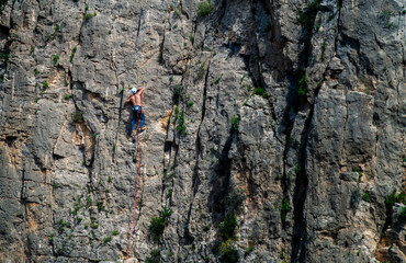 A climber on a mountain wall 