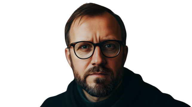Serious Man with Glasses and Beard Against Black Background