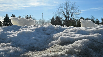 Pile up of ice and snow at the public park.
