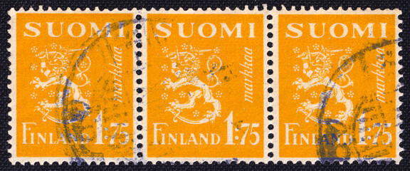 Set of three stamps from Finland, issued in 1940, featuring the heraldic lion, lion with sword - National Emblem of Finland 1930. 