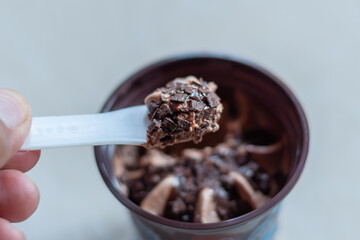 Indulge in this decadent delight! A scoop of rich chocolate ice cream, crowned with crunchy coco crisps and a sprinkle of chocolatey goodness. Perfect for foodies and sweet cravings