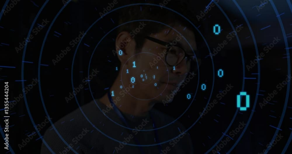  at school, animation overlaying binary code on person working on computer