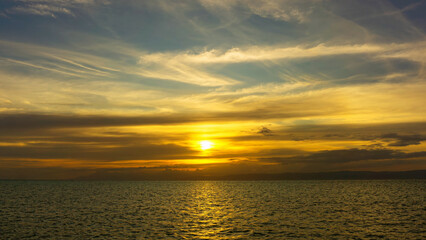 Stunning sunset over calm ocean waters