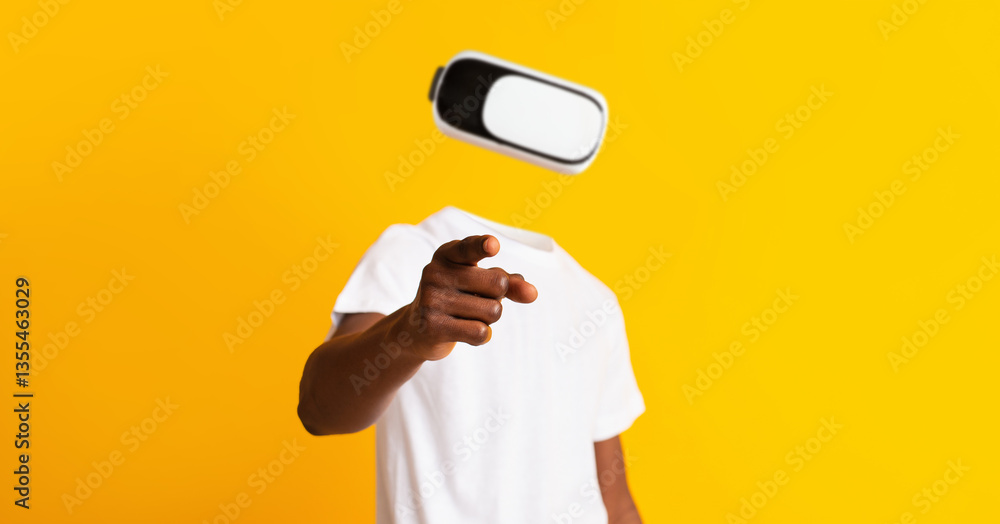Aufkleber A user is immersed in virtual reality, pointing with one hand while wearing a headset. The vivid yellow background highlights the modern technology used for augmented reality exploration.