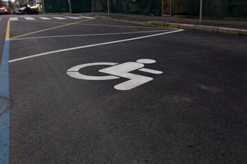 Handicap parking space with sign and wheelchair symbol
