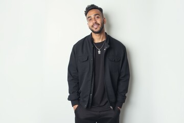 Half-Length (Waist-Up) portrait of young stylish smiling Libyan male model in goth wear isolated on pure white background looking at camera