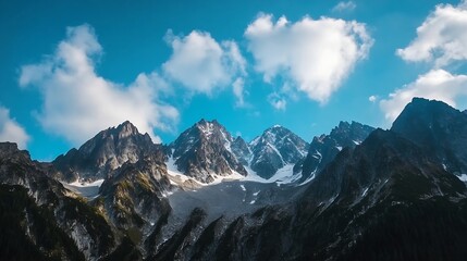 Obraz premium Breathtaking Rocky Mountain Peaks with Dramatic Clouds and Clear Blue Skies in the Background : Generative AI