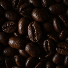 Naklejka premium Dark roasted coffee beans against a textured background 