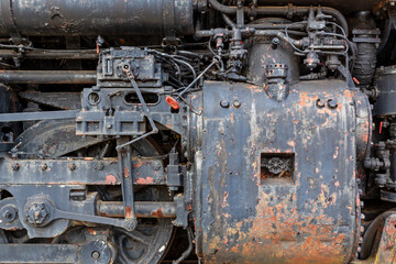 Detail of a locomotive train engine steampunk background