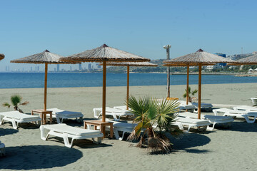 beach chairs and umbrellas on the beach
