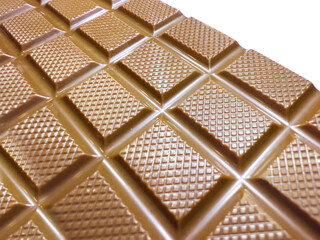 Sweet Milk Chocolate on a White Background – Delicious and Creamy Treat