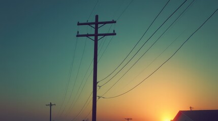 A close-up of an electric pole with power lines in the foreground, leaving surrounding space for copy.