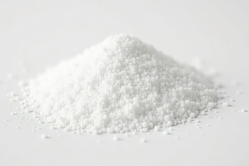 Pile of white granulated sugar on white background, white, refined sugar, texture