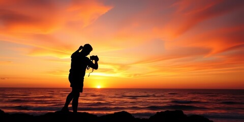 Silhouette of figure photographing vibrant sunset over ocean, camera, picture