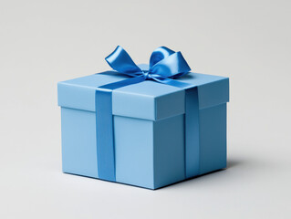 Obraz premium bright blue gift box tied with satin ribbon, perfect for celebrations and special occasions, evokes joy and excitement