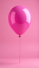 Single pink balloon with glossy surface in soft focus, decoration, girly, Isolated