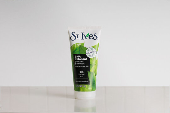 St. Ives brand BHA or beta hydroxy acid exfoliant with green tea, bamboo and salicylic acid, a facial cleanser for acne prone skin, on a soft white background with copy space