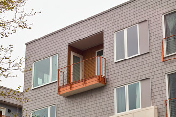 Modern Balcony on Brick Building Facade
