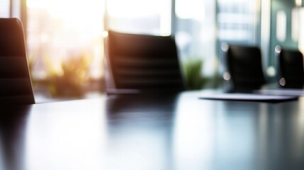 Minimalist meeting table with soft lighting, symbolizing focus and professionalism in a modern workspace.

