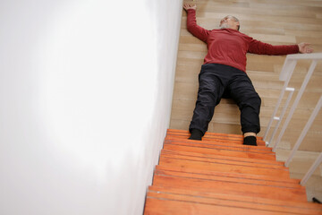 Elderly Man Faints After Falling Down On Stairs At Home