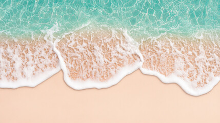 Fototapeta premium Waves gently wash over sandy beach
