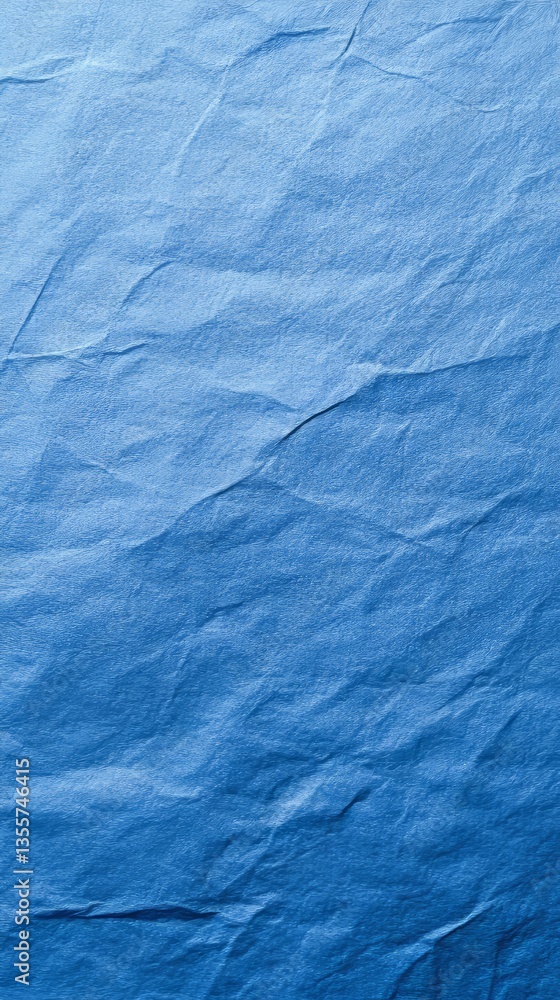 Poster textured blue paper with subtle wrinkles, creating a visually appealing and tactile background.