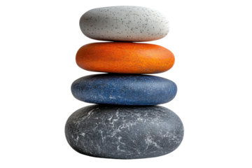 A stack of colorful stones showcasing natural textures and patterns on a white isolated background.
