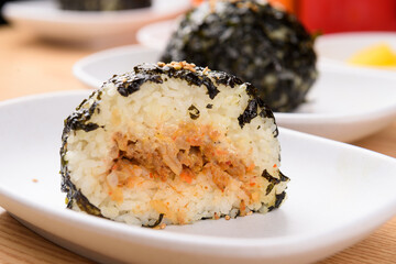 Kimchi and tuna inside Korean style seaweed powder rice ball