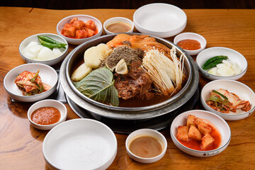 Spicy Kimchi Potato Pork Bone Soup with Various Side Dishes