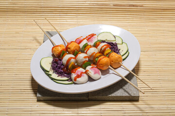 delicious barbeque satay dish. a plate of barbeque satay
