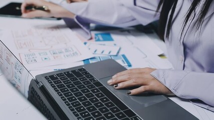 Website designer, Creative planning phone app development template layout framework wireframe design, User experience concept, Young asian woman UX designer working on smartphone application at office