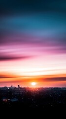 Fototapeta premium Vibrant Sunset Cityscape Orange Purple Pink Hues
