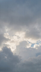 Obraz premium Dramatic sky with soft clouds illuminated by sunlight, nature's beauty