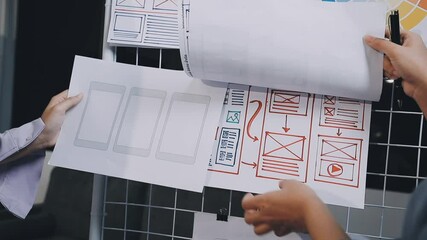 Website designer, Creative planning phone app development template layout framework wireframe design, User experience concept, Young asian woman UX designer working on smartphone application at office