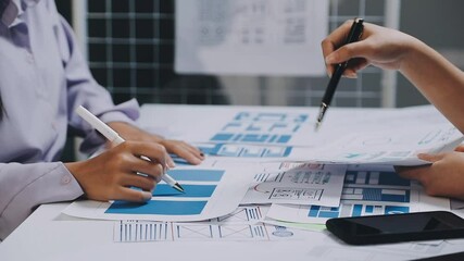 Website designer, Creative planning phone app development template layout framework wireframe design, User experience concept, Young asian woman UX designer working on smartphone application at office