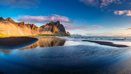 Obraz premium icelandic seascape wonderful evening landscape of vestrahorn iceland at stokksnes on the southeastern icelandic coast iceland europe amazing nature scenery popular travel destinations