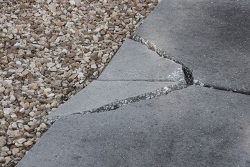 Sidewalk Cracked and Split in Two Places
