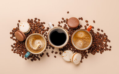 A steaming cups of freshly brewed coffee surrounded by rich, aromatic roasted coffee beans