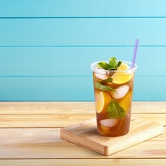 Fototapeta premium Refreshing drink placed on a wooden table surrounded by natural light and inviting atmosphere